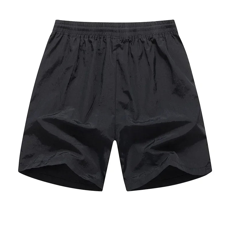 Shorts de course homme avec sous-shorts en mesh et poches zippées – Modèle Nikoas