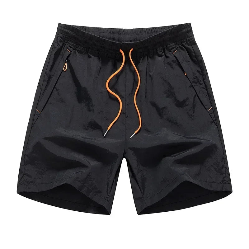 Shorts de course homme avec sous-shorts en mesh et poches zippées – Modèle Nikoas